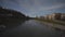 Salzburg, Austria. Cityscape over river in Salzburg on sunny winter day. Salzach riverfront. Embankment of Salzach river
