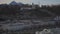 Salzburg, Austria. Cityscape over river in Salzburg on sunny winter day. Salzach riverfront. Embankment of Salzach river