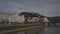 Salzburg, Austria. Cityscape over river in Salzburg on sunny winter day. Salzach riverfront. Embankment of Salzach river