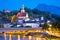 Salzburg historic architecture and mountain peaks background evening view