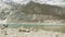 SAMAGAON, NEPAL - MARCH, 2018: Tourists have a rest on the mountain lake Birendra in Himalaya near Manaslu.