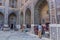 SAMARKAND, UZBEKISTAN: APRIL 28, 2018: Souvenir stalls at the courtyard of Ulugh Beg Madrasa in Samarkand, Uzbekist