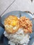 Sambal tempeh rice with fried egg, a simple food menu from Indonesia