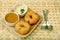 Sambar vada with sambar and coconut chutney a South Indian food, on wooden background