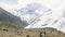 SAMDO, NEPAL - MARCH, 2018: Tourists do trekking in the mountain in Himalaya.