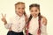 On same wave. Schoolgirls wear formal school uniform. Sisters little girls with braids ready for school. School fashion