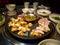 Samgyeopsal, grilled pork belly. Makchang, grilled abomasum, the fourth and final stomach compartment in ruminants of cattle.