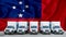 Samoa flag in the background. Five new white trucks are parked in the parking lot. Truck, transport, freight transport. Freight