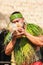 A Samoan Man demonstrating how to start fire using a coconut