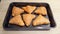 Samosa cooked in the oven . Cakes of flaky pastry stuffed
