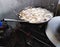 Samosa frying in hot oil. Indian fast food. Goa