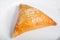 Samosa on white plate