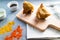 Samosas filled with lamb and  chicken on a wooden table. Indian cuisine. Close up view