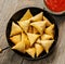 Samosas Indian snack in frying pan