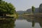 Sampan boat-ride, rowed by a villager at Tam Coc , Vietnam : the karst landscape with many vertical