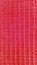 A sample of fabric for furniture upholstery and tailoring of covers for chairs, sofas and armchairs. Bright red color