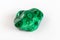 A sample of the mineral malachite on a white