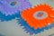 Sample product of plastic cogwheel gears for education. Colorful