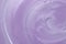 Sample of violet shower gel on white background, closeup