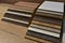 Samples of fibreboard panels with wood texture. Laminated CPD. Chipboard PVC edge. Wooden furniture CMD and MDF