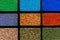 Samples of multi-colored drywall construction material for the decoration of the facade and interior of buildings