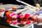 Samples of nail polish of different colors and shades applied to the tester plate.