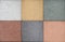 Samples of outdoor floor tiles of different colors. Artificial stone.