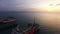 Samui ferry boats on the sunset on island in Thailand