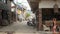 SAMUI ISLAND, THAILAND - MAY 27, 2019: Typical touristic street in Fisherman village with souvenir stores. View of calm lane of