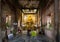 Samut Songkhram,Thailand-May 20,2019:Old golden buddha statue in church,ancient temple of Wat Bang Kung,outside is covered with