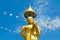 Samutprakarn, Thailand - July 19; Thai Buddhist decorate temple and Statue with Thailand flag and yellow Buddhism symbol flag to