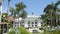 San Buenaventura City Hall as seen from a distance with palm trees