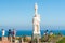 San Diego, CA. Juan Rodriguez Cabrillo statue. Beautiful blue San Diego bay background