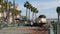 SAN DIEGO, CALIFORNIA USA - 13 FEB 2020: Coaster Commuter and palms, public rail transportation in America. Express passenger