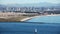 San Diego skyline with a sailboat moving in the foreground