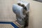 San Francisco, California - July 10, 2019: A very dirty, rotten and moldy Dyson Airblade hand dryer in a public restroom. The