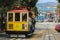 San Francisco, California - Mai 23, 2015: Tourists riding on the iconic cable car, blue sky day at top of Hyde Street view