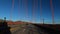 San Francisco California USA - January 2020. Driving famous Golden Gate Bridge , no clouds blue clear sky