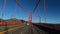 San Francisco California USA - January 2020. Driving famous Golden Gate Bridge , no clouds blue clear sky