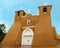 San Francisco de Asis Mission Church in rain - unique adobe architecture located in Taos New Mexico