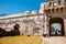 San Francisco de Campeche, Mexico: Pirate ship and bell at the entrance to the fortress. Land gate Puerta de Tierra