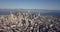 San Francisco downtown city aerial drone rotate left overlooking the bay bridge