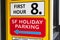 San Francisco holiday parking sign advertises parking garage and first hour parking rate for downtown shoppers