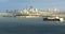 San Francisco skyline with container ship in front 4K