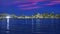 San Francisco sunset skyline in California with reflection in bay water