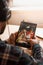 SAN FRANCISCO, US - 1 April 2019: Young man enjoying his favorite music, using Marshal headphones, in San Francisco, California,