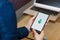 SAN FRANCISCO, US - 22 April 2019: Close up to female hands holding smartphone using Google Digital Wellbeing