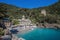 San Fruttuoso di Camogli, Ligurian coast, Genoa province, with its ancient Abbaey, the beach and tourists, Italy