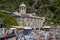 San Fruttuoso di Camogli, Ligurian coast, Genoa province, with its ancient Abbaey, the beach and tourists, Italy