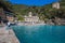 San Fruttuoso di Camogli, Ligurian coast, Genoa province, with its ancient Abbaey, the beach and tourists, Italy